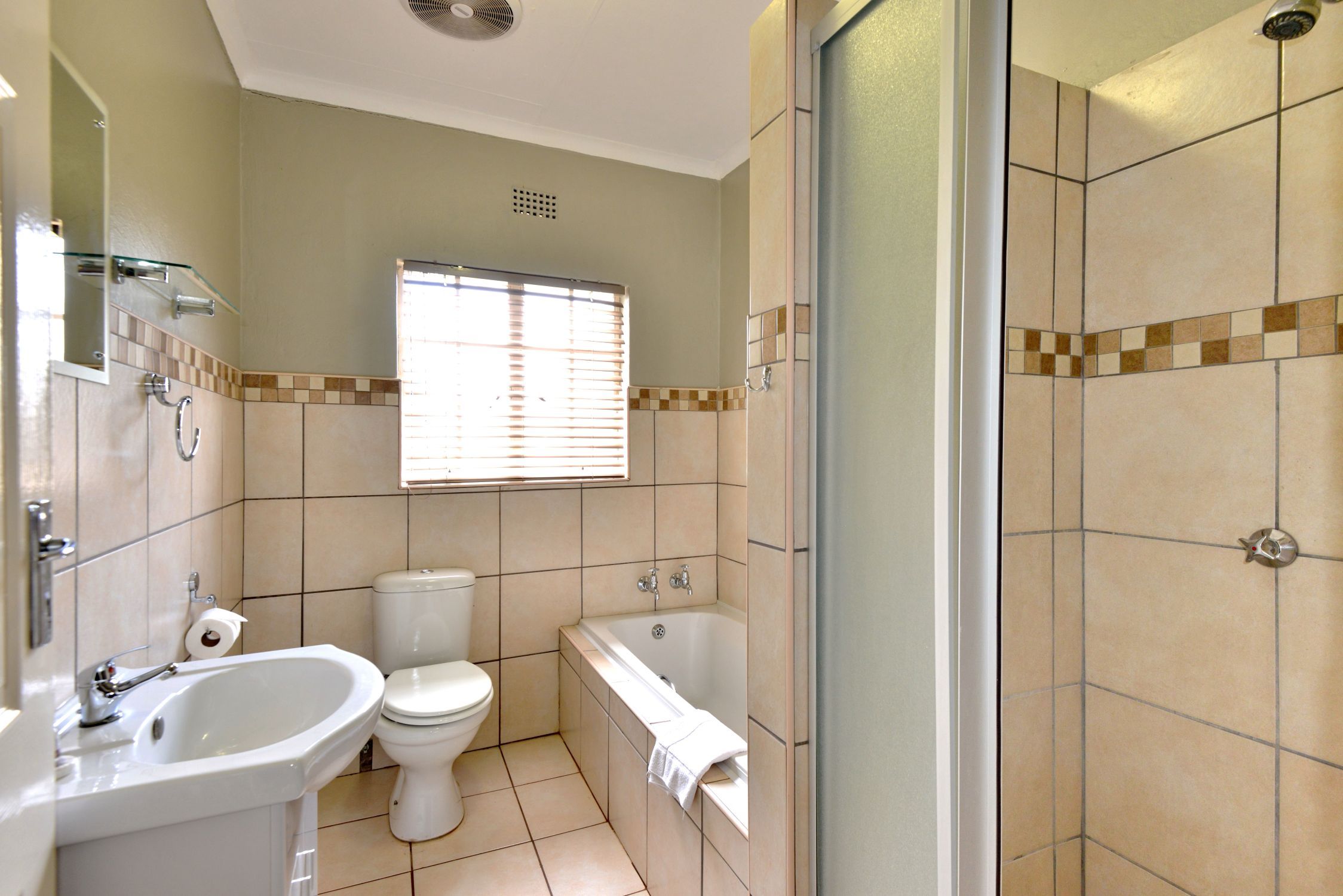 Executive One-Bedroom Chalet bathroom near Sun City at Sundown Country Estate