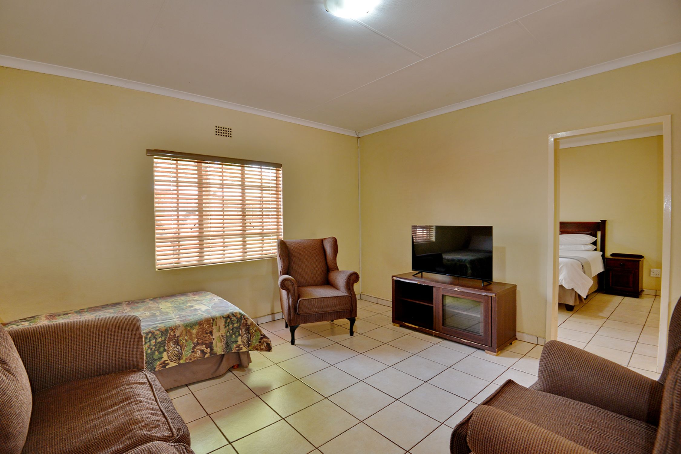 Executive One-Bedroom Chalet living area near Sun City and Pilanesberg