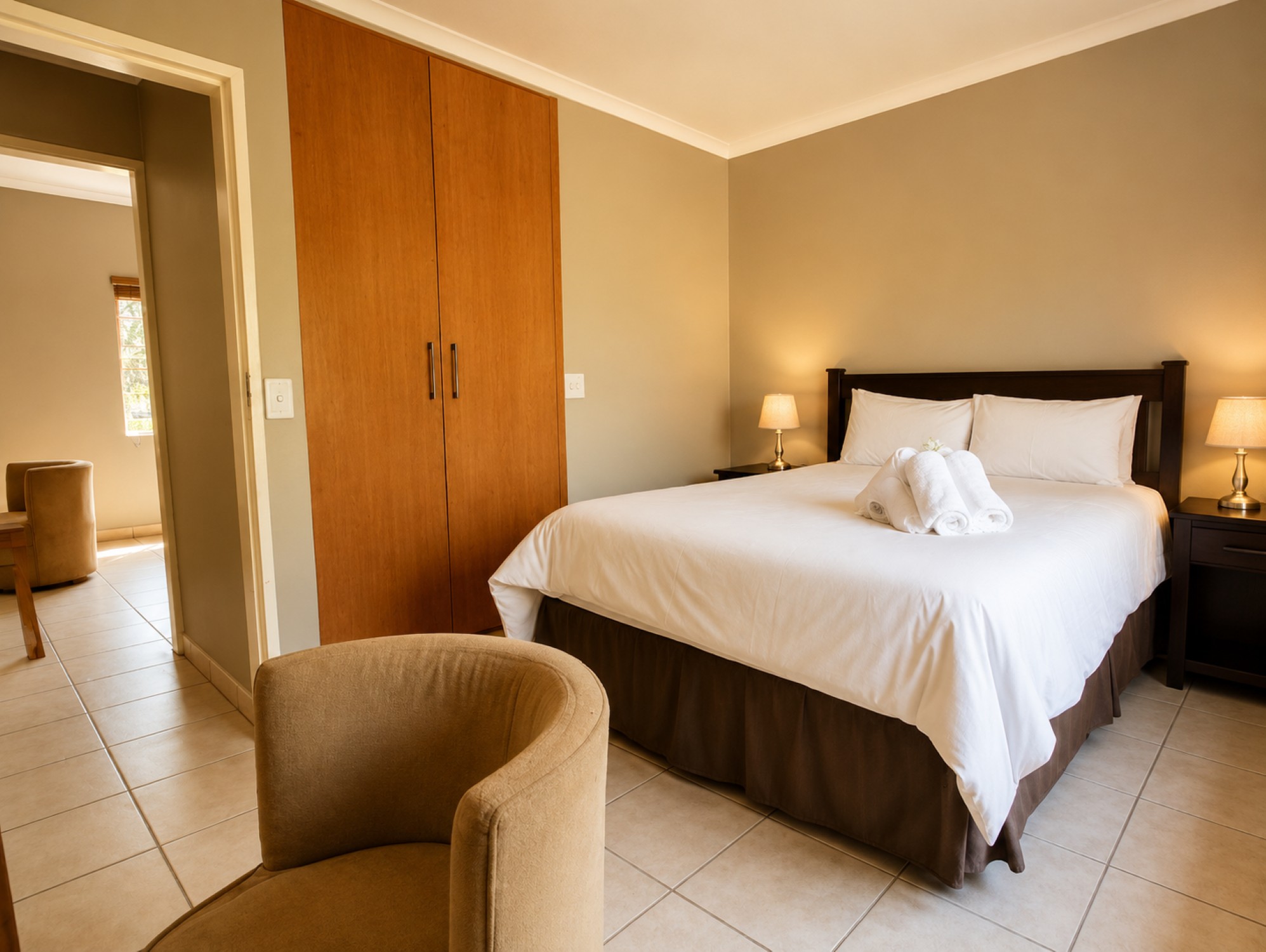 Executive Two-Bedroom Self-Catering Chalet bedroom near Sun City