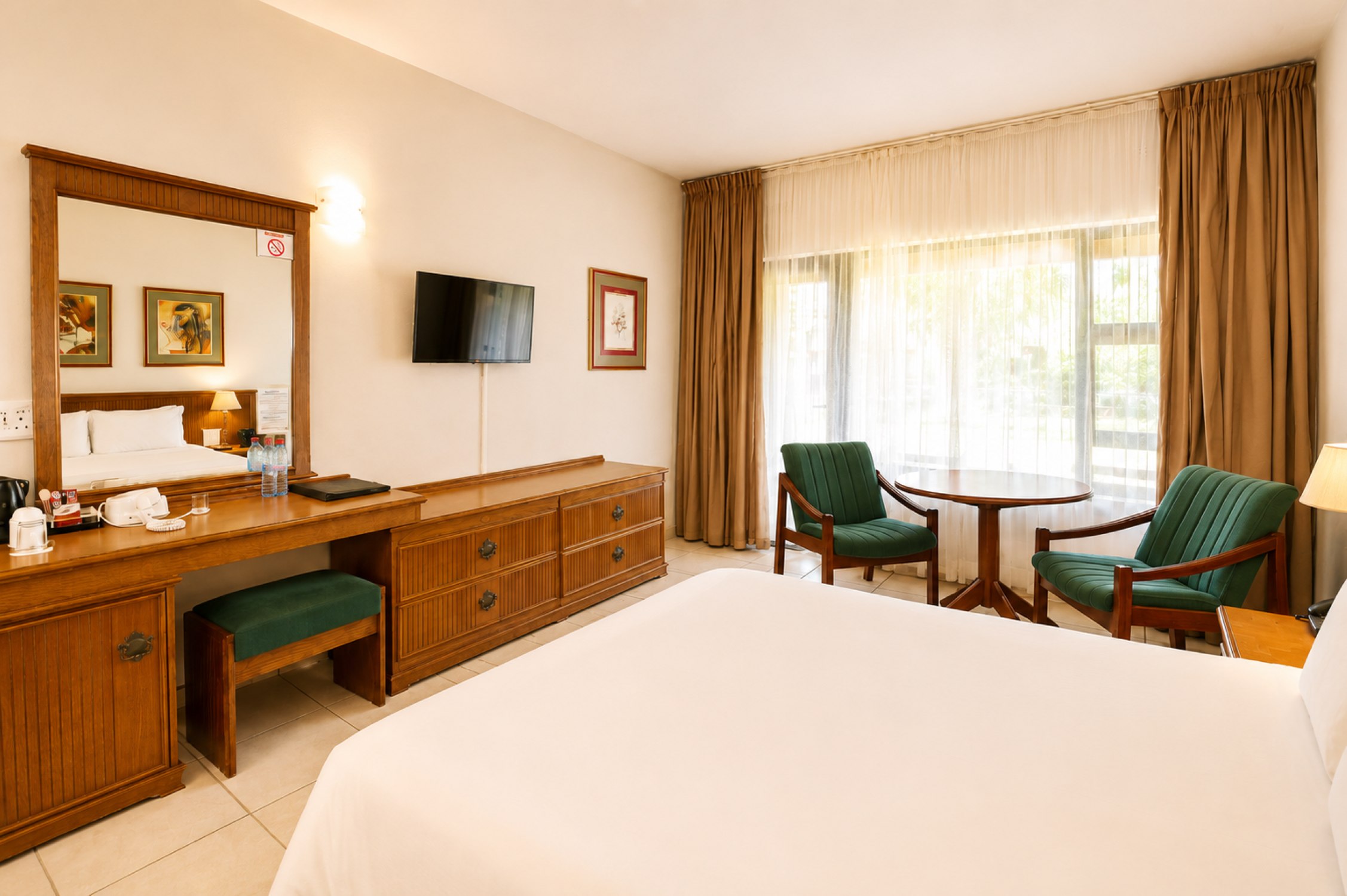 Standard Double Room with TV and desk area near Sun City