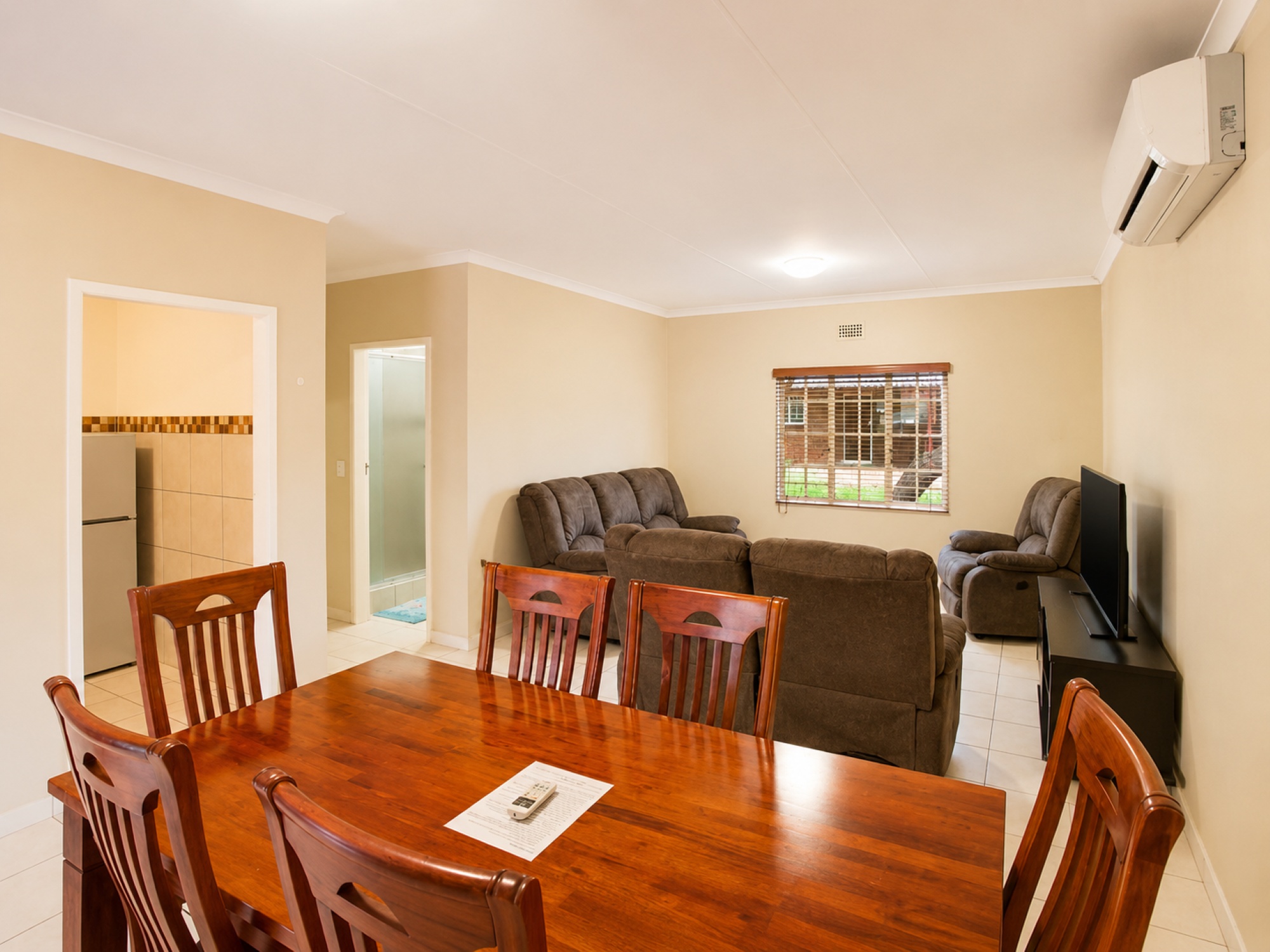 Dining and lounge area in the Standard Two-Bedroom Chalet near Pilanesberg