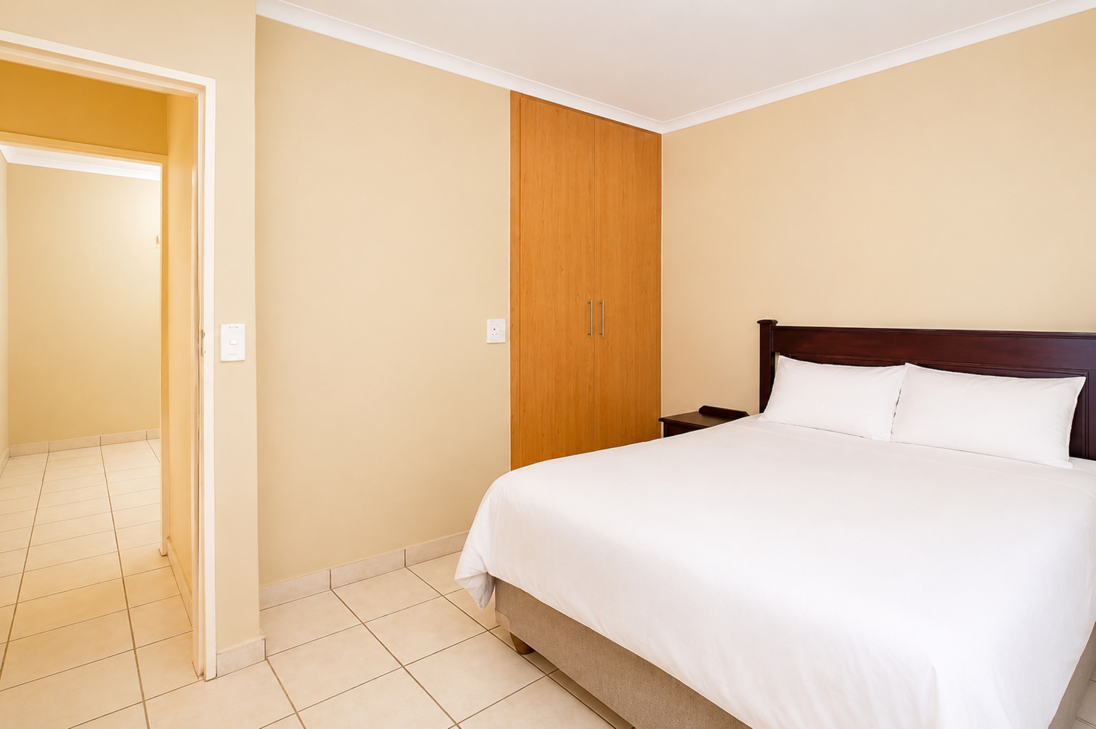 Main bedroom in the Standard Two-Bedroom Self-Catering Chalet near Sun City